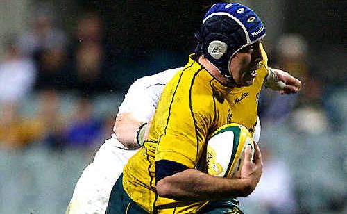 Australian prop Ben Daley scoots away against England last Saturday night. Australian prop Ben Daley scoots away against England last Saturday night.